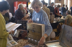 Artist Diane Cassidy demonstrates one of her creations, made from an old letterbox Artist Diane Cassidy demonstrates one of her creations, made from an old letterbox