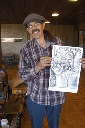 Artist John Betts displays his White House Ghouls poster Artist John Betts displays his White House Ghouls poster