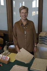 P. Kay Hille-Hatten shows off some of her handmade paper