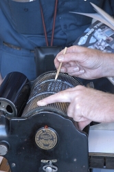 A close-up view of the Printer's Guild's Multigraph Junior No. 40 press