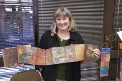 Cari Ferraro with an accordian book