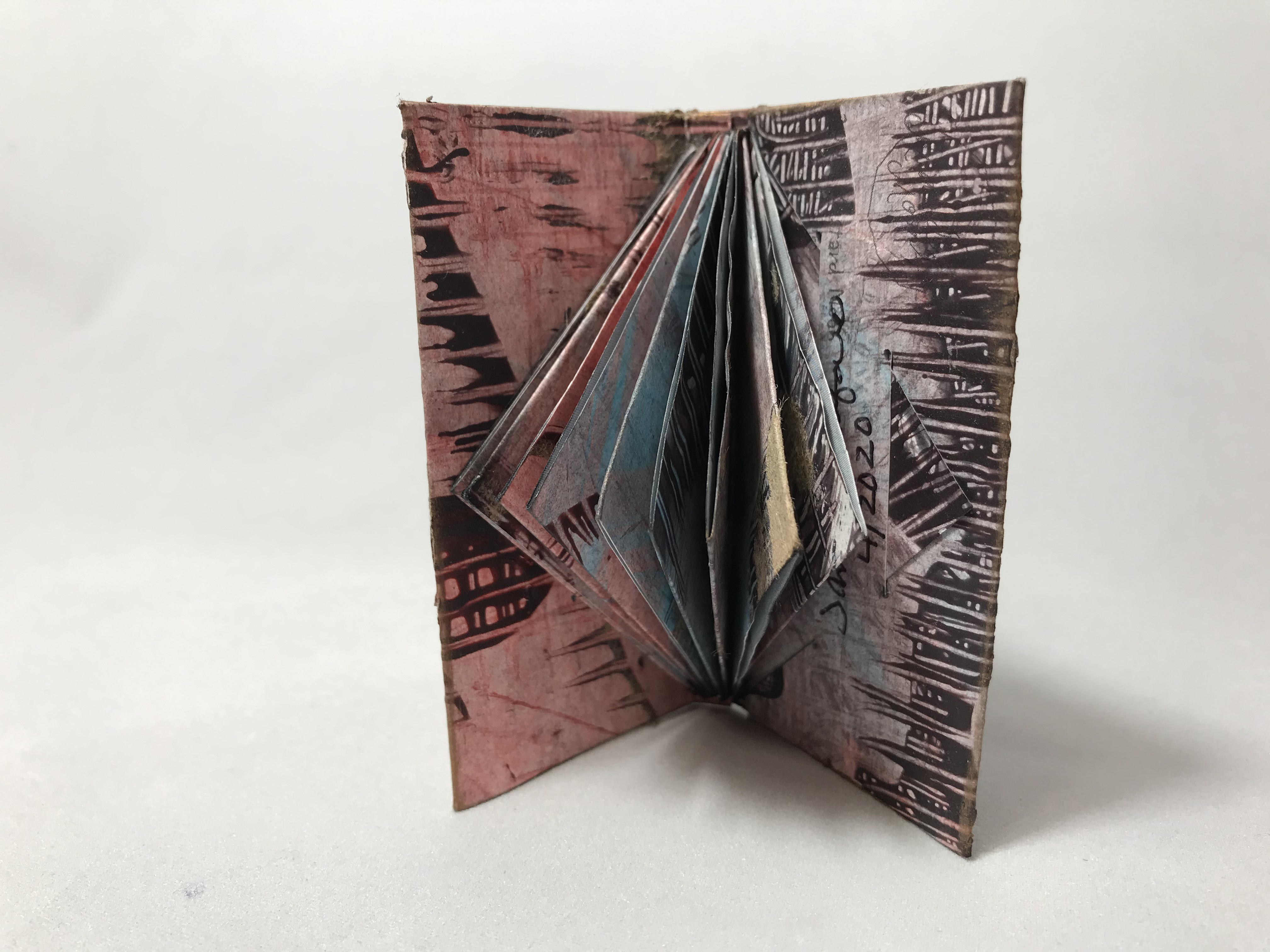 Jamila-Rufago-Triangle-Book-open